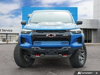 This 2023 Chevrolet Colorado 4WD ZR2, in striking Glacier Blue Metallic, is engineered for uncomprom... (image 1)