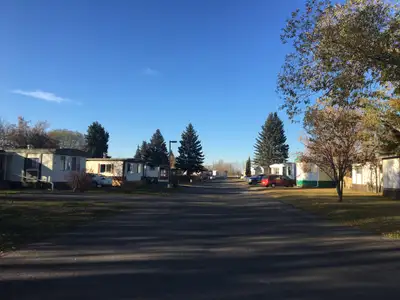 We have 1 LOT LEFT! Nice quiet park, well maintained. Lot rent is $575.00 and the lot size is 12x62...