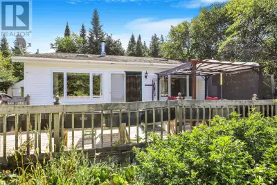 Welcome to this charming 3-bedroom, 1-bathroom cabin offering a comfortable layout and beautiful sur...