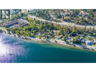 Discover nearly four acres of prime semi-waterfront property in the heart of the Okanagan, offering...