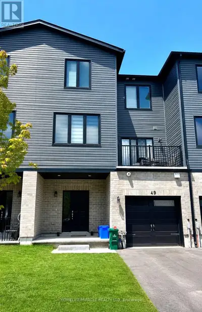 Welcome to 49 Evans Street, townhouse available for lease, offering approximately 1,285 sq. ft. of b...