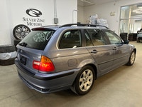 This 2002 BMW 325i Wagon is an excellent example of a clean, well-kept BMW E46 Touring. Showing just... (image 3)
