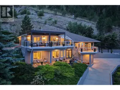 Enjoy unobstructed panoramic lake, downtown skyline and mountain views, steps from the beach and nex...