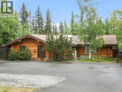Timeless Yukon character. Fresh updates. Situated in desirable Crestview and backing onto a treed gr...