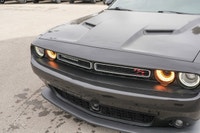 Lets be honest: you dont buy a Scat Pack to be subtle. You buy it because you want to hear the roar... (image 8)
