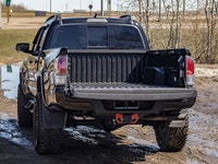 This Toyota is a tough and reliable midsize truck that is built for both everyday driving and off-ro... (image 7)