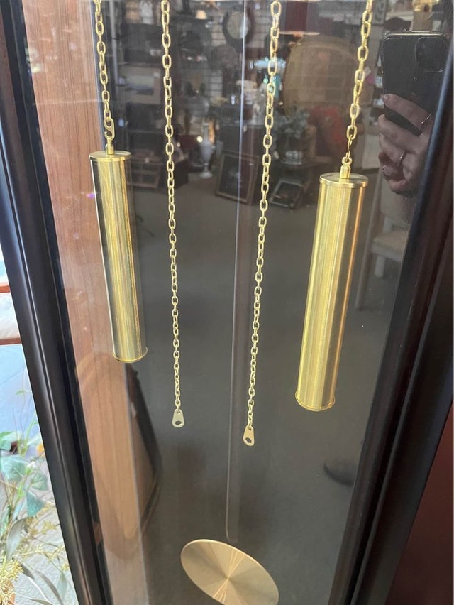 grandfather clock! Dark brown in colour and a gold face Arts & Collectibles Calgary