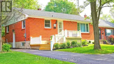 This beautifully updated brick bungalow offers the ideal blend of comfort, space, and location. Nest...