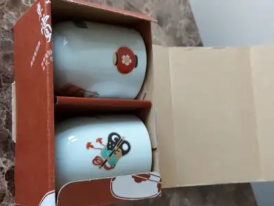 A set of Japanese ceramic tea cups, View more