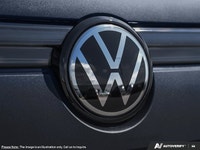 This Volkswagen Tiguan has a trusty Intercooled Turbo Regular Unleaded I-4 2.0 L/121 engine powering... (image 7)