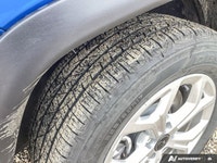 This *2025 Jeep Compass Sport* in striking *Laser Blue Pearl* delivers the perfect balance of capabi... (image 9)