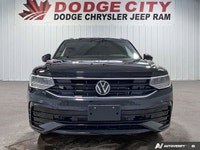 This Volkswagen Tiguan boasts a Intercooled Turbo Regular Unleaded I-4 2.0 L/121 engine powering thi... (image 8)