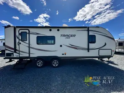 You can easily fix meals and snacks at the rear kitchen in the 253AIR Tracer Air travel trailer by P...