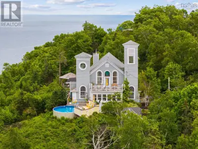 Perched above Halifax Harbour in the heart of Fergusons Cove, 4 York Redoubt Crescent is a one-of-a-...