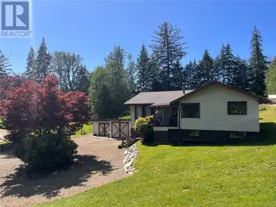 Just 35 minutes from Campbell River, this 12.8 acre piece of paradise awaits you. Fully landscaped w...
