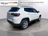 The 2024 Jeep Compass North 4x4 in stunning White offers exceptional handling and capability with it... (image 2)