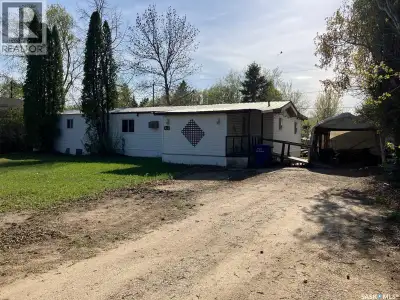 Welcome to 407 Railway Ave, White Fox, SK! This home features 3 bedrooms, spacious porch, good size...