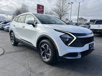 Awarded an IIHS Top Safety Pick, the 2023 Kia Sportage LX in striking Snow White Pearl ensures peace... (image 2)