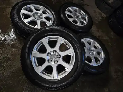Nice set of original Audi Q5 wheels on Dunlop winter tires. Wheels: 17x7 Offset: 37 Bolt pattern: 5x...