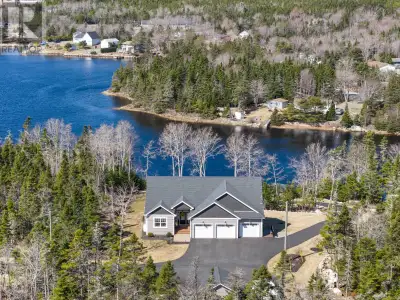 Only 5 years old & Set on 178 ft of Ocean frontage on Prospect Bay, this property is a boaters dream...