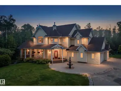 Welcome to your private modern farmhouse retreat, perfectly situated on 7.17 beautifully treed acres...
