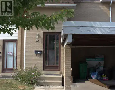 LOCATION LOCATION LOCATION! Backing onto a trail and conveniently located across from visitor parkin...