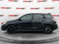 This outstanding example of a 2005 Toyota Matrix XR | 5 SPEED | AIR CONDITIONING | POWER LOCKS | BLU... (image 1)