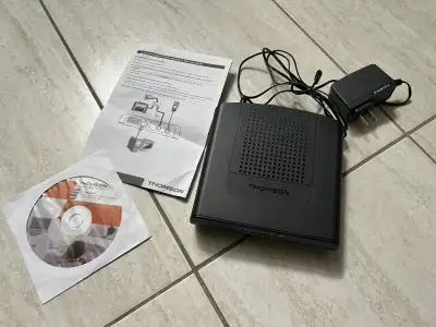 Like new - Thomson DCM-476 cable modem, View more