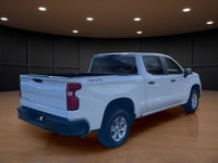 The 2023 Chevrolet Silverado 1500 Crew Cab Short Box 4-Wheel Drive Work Truck, in crisp white with a... (image 5)