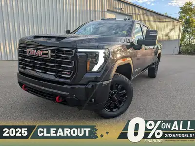 Presenting the 2025 GMC Sierra 3500HD AT4, dressed in a distinguished gray with a robust 44 drivetra...