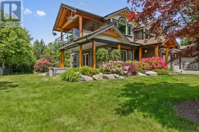Tucked into a private, sun-soaked setting, this timber-framed executive home offers a lifestyle shap...