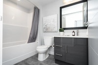 Two-bedroom suite with open floorplan. Includes a large walk-in closet and full ensuite bathroom off... (image 1)