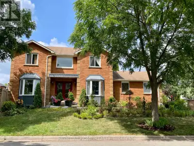 Nestled on a prime corner lot, this home boasts a special blend of privacy and unparalleled curb app...