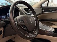 The 2016 MKX Reserve is characterized by its "Split-wing" front grille and a full-width LED taillamp... (image 4)