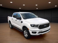 Experience the power of a 2019 Ford Ranger XLT in a crisp white finish, equipped with a robust 4x4 d... (image 3)