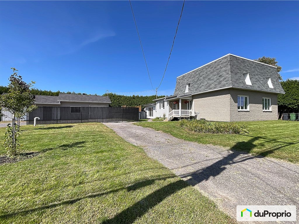 $625,000 - 2 Storey for sale in St-Sulpice — photo 1