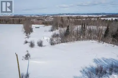 Set atop Laird Hill with expansive views over the Bar River flats, this impressive 42-acre agricultu...