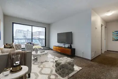 Amenities: Air Conditioning • Affordable Parking • Heat & Water Included Suite & Building: Spacious...
