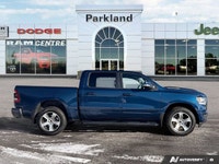 This 2020 Ram 1500 Sport stands out in *Patriot Blue Pearl*, powered by the legendary *5.7L HEMI V8*... (image 4)