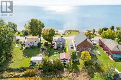 Quaint 1.5 storey 2 bedroom, 2 bathroom home on Lake Erie Waterfront - owns both sides of the road....