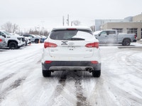 This 2014 Hyundai Santa Fe Sport Limited is powered by a responsive 2.0L turbocharged four-cylinder... (image 6)