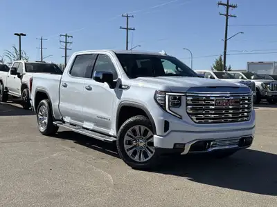 AMVIC Licensed Dealer A sight to behold in Glacier White Tricoat, the 2026 GMC Sierra 1500 DENALI ra...