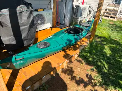 Old Town Castine 129 Kayak. This is one of the older triple layer kayaks….comes with 2 sealed hatche...