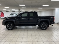 Engineered for drivers who want capability without compromising conscience, this 2025 Toyota Tacoma... (image 2)