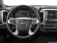 The 2017 GMC Sierra 1500 4WD Crew Cab Short Box SLE in a striking gray color combines powerful 44 ca... (image 3)