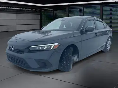 The 2024 Honda Civic Sedan LX-B CVT in sophisticated gray combines front-wheel drive with precise ha...
