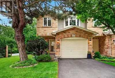 Welcome to this beautifully maintained Marz Homes end-unit townhome, ideally situated in a charming...