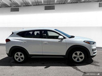 The 2020 Hyundai Tucson in Crystal White features all-wheel drive with advanced safety like lane dep... (image 6)