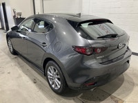 La Mazda Mazda3 Sport GT 2021 usagée proposée par AutoStudio 72 à Mirabel affiche 98 862 km et une p... (image 1)