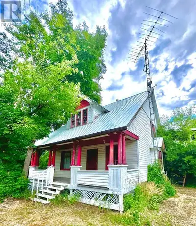 Welcome to your dream county home! This enchanting 2-story historical farmhouse offers the perfect b...